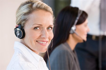 simsearch:400-08293929,k - Face of young charming confident woman with headset Stock Photo - Budget Royalty-Free & Subscription, Code: 400-04111371