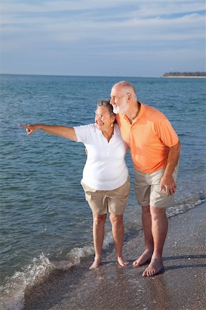 senior woman exercising by ocean - Retired senior couple on vacations taking in the sights at the beach. Stock Photo - Budget Royalty-Free & Subscription, Code: 400-04111509