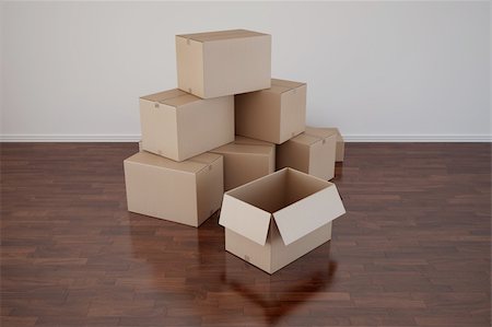 3d rendering of cardboard boxes in a empty room with dark wood floor Stock Photo - Budget Royalty-Free & Subscription, Code: 400-04111912