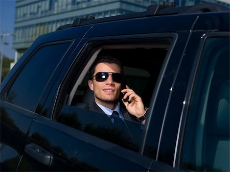 Portrait of business man outside the building Stock Photo - Budget Royalty-Free & Subscription, Code: 400-04111986