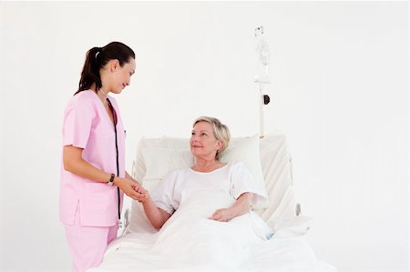 Young Nurse with a elderly woman Stock Photo - Budget Royalty-Free & Subscription, Code: 400-04112080