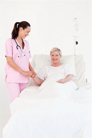 simsearch:400-04811586,k - Young Nurse with an elderly Patient Fotografie stock - Microstock e Abbonamento, Codice: 400-04112090