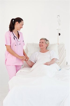 simsearch:400-04811586,k - Young Nurse with an elderly Patient Fotografie stock - Microstock e Abbonamento, Codice: 400-04112091