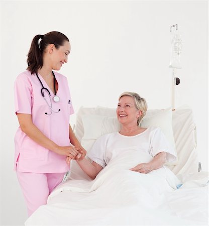 simsearch:400-04811586,k - Young Nurse with an elderly Patient Fotografie stock - Microstock e Abbonamento, Codice: 400-04112092