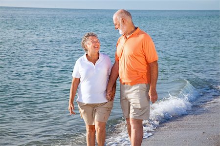 senior woman exercising by ocean - Senior couple at the beach, looking into each others eyes. Stock Photo - Budget Royalty-Free & Subscription, Code: 400-04112829