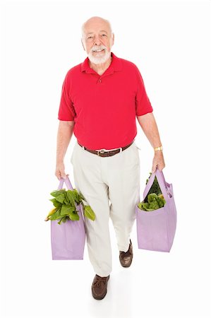 food market old people - Senior man carries his groceries home in reusable cloth shopping bags.  Full body isolated. Stock Photo - Budget Royalty-Free & Subscription, Code: 400-04112954