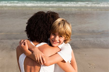 Potrait of aYoung boy hugging his mother Stock Photo - Budget Royalty-Free & Subscription, Code: 400-04113088