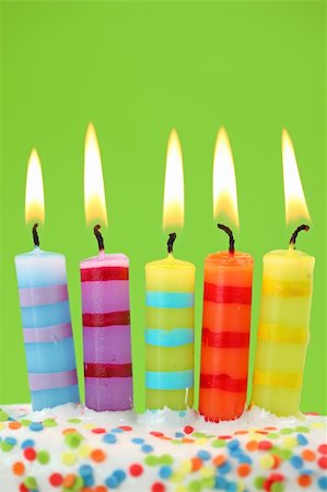 red and yellow confetti - Five birthday candles on green background Stock Photo - Budget Royalty-Free & Subscription, Code: 400-04113377