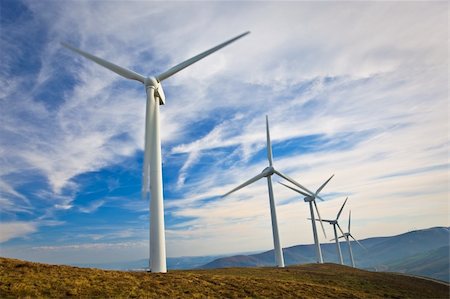 simsearch:400-03912255,k - Windmills turning on the sunset in summer. Motion blur Stock Photo - Budget Royalty-Free & Subscription, Code: 400-04113685