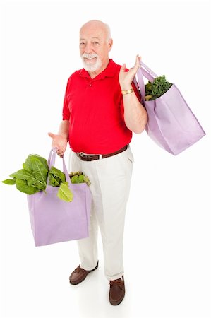food market old people - Handsome senior man shops for organic produce using reusable cloth grocery bags.  Isolated on white. Stock Photo - Budget Royalty-Free & Subscription, Code: 400-04113980