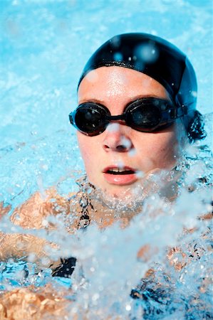 female swimmer cap goggles - Woman in swimming cap in the pool Stock Photo - Budget Royalty-Free & Subscription, Code: 400-04124188