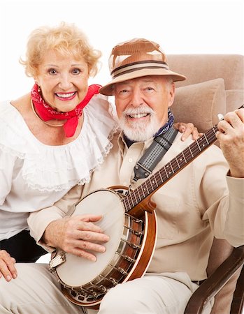 Portrait de couple senior qui joue banjo et chante de la musique country. Photographie de stock - Aubaine LD & Abonnement, Code: 400-04124574