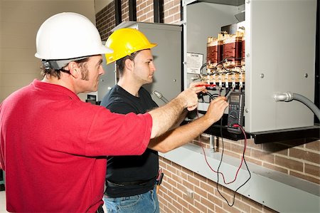 distribution center - Vocational education student learns how to repair an industrial power distribution center. Stock Photo - Budget Royalty-Free & Subscription, Code: 400-04124588