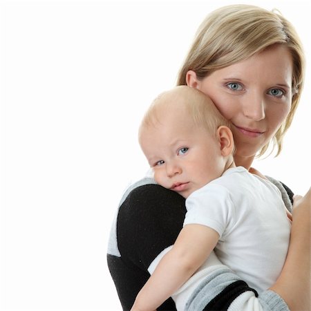 A mother and her tired cute baby boy isolated on white background Stock Photo - Budget Royalty-Free & Subscription, Code: 400-04124628