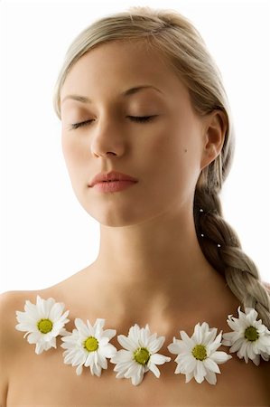 simsearch:400-03914122,k - closed eyes portrait of a beautiful woman with twist braid and a flowers necklace Foto de stock - Super Valor sin royalties y Suscripción, Código: 400-04124699