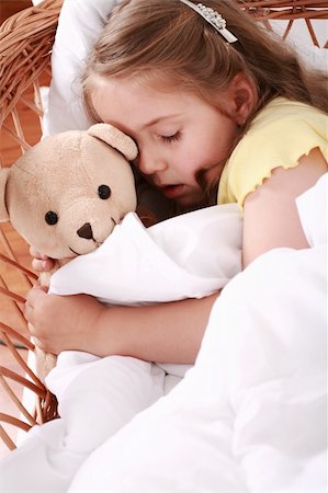 small little girl pic to hug a teddy - Portrait of cute little girl sleeping with teddy Stock Photo - Budget Royalty-Free & Subscription, Code: 400-04125020