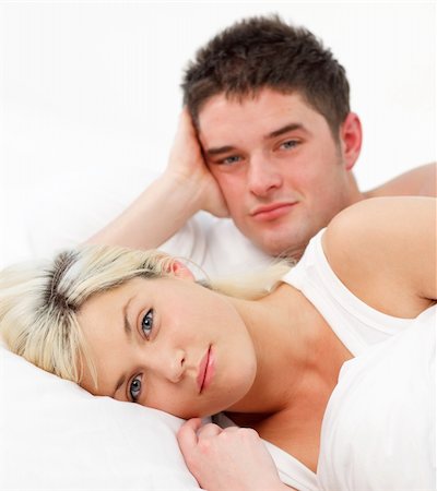 Portrait of a couple lying together in bed Stock Photo - Budget Royalty-Free & Subscription, Code: 400-04125214