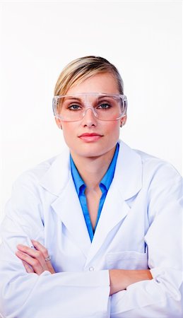 simsearch:400-04881576,k - Sérieux scientifique féminin en regardant la caméra en laboratoire Photographie de stock - Aubaine LD & Abonnement, Code: 400-04125255