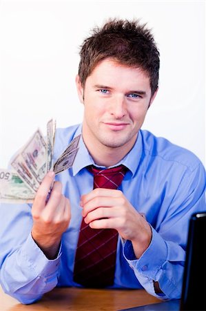 Male businessperson holding money in his hand Stock Photo - Budget Royalty-Free & Subscription, Code: 400-04125270