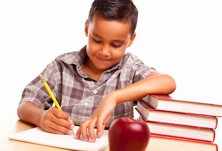 simsearch:400-04125503,k - Adorable garçon hispanique avec livres, Apple, crayon et papier isolé sur fond blanc. Photographie de stock - Aubaine LD & Abonnement, Code: 400-04125513