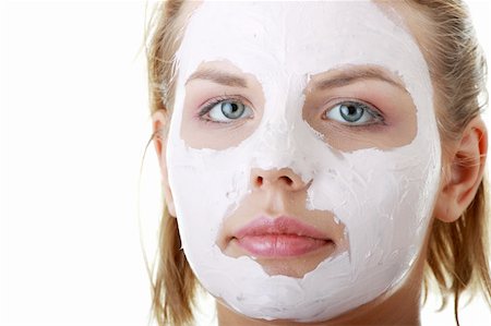 simsearch:400-07952664,k - Cosmetics mask of clay on the  young female face Foto de stock - Super Valor sin royalties y Suscripción, Código: 400-04125738