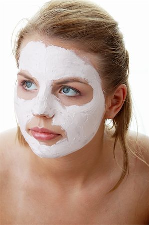 face and cleanse and one person - Cosmetics mask of clay on the  young female face Stock Photo - Budget Royalty-Free & Subscription, Code: 400-04125745