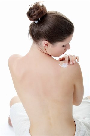 skin back dress - Skincare concept: back of beautiful nude woman with soft skin putting skincare product (cream) on her back Stock Photo - Budget Royalty-Free & Subscription, Code: 400-04125754