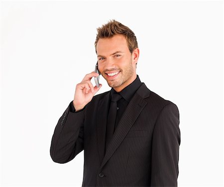 simsearch:400-04608943,k - Smiling male businessmanager talking on the phone looking at the camera Stock Photo - Budget Royalty-Free & Subscription, Code: 400-04126247