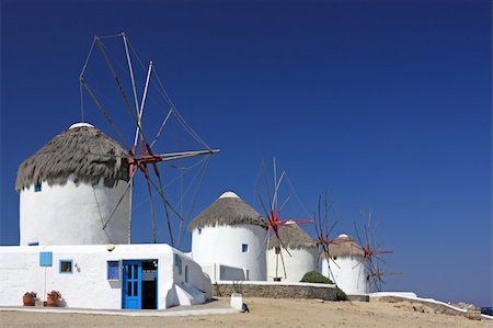 The row of the Lower Windmills in Mykonos Island, Greece Stock Photo - Budget Royalty-Free & Subscription, Code: 400-04126539