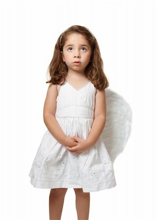 Little angel girl wearing a beautiful white embroidered dress.  She has her hands gently clasped and is looking up toward heaven or sky Stock Photo - Budget Royalty-Free & Subscription, Code: 400-04126621