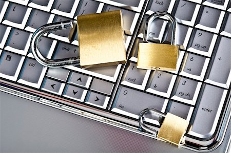 simsearch:400-07546122,k - Padlock and notebook computer Stock Photo - Budget Royalty-Free & Subscription, Code: 400-04126824