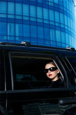 Portrait of beautiful business woman inside the limo car Stock Photo - Budget Royalty-Free & Subscription, Code: 400-04126854