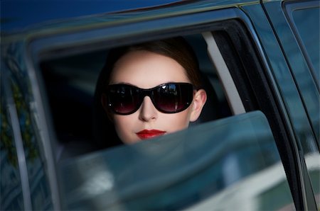 Portrait of beautiful business woman inside the limo car Stock Photo - Budget Royalty-Free & Subscription, Code: 400-04126859