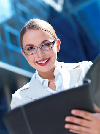 Beautiful business woman standing outdoor modern building Stock Photo - Budget Royalty-Free & Subscription, Code: 400-04126869