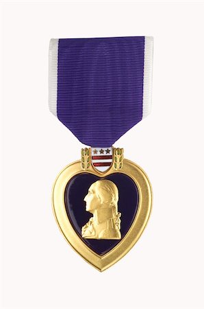 Purple Heart shot on light background Stock Photo - Budget Royalty-Free & Subscription, Code: 400-04127055
