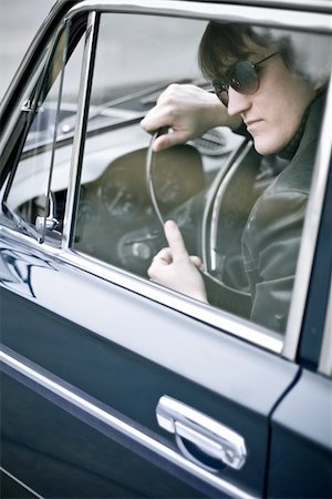 gangster in a car Stock Photo - Budget Royalty-Free & Subscription, Code: 400-04127239