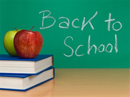 simsearch:400-04127315,k - Back to school written on a chalkboard. Two apples over books on the foreground. Stock Photo - Budget Royalty-Free & Subscription, Code: 400-04127310