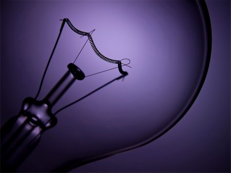 simsearch:400-05019823,k - Close up on a transparent light bulb over a purple background. Stock Photo - Budget Royalty-Free & Subscription, Code: 400-04127349