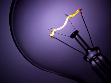simsearch:400-05019823,k - Close up on a transparent light bulb over a purple background. Stock Photo - Budget Royalty-Free & Subscription, Code: 400-04127351