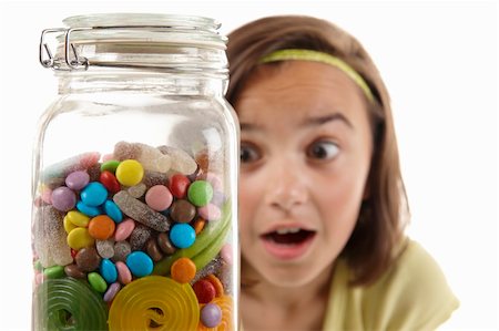 spoiled for choice - young girl looking with excitement and awe at candy jar Stock Photo - Budget Royalty-Free & Subscription, Code: 400-04127985