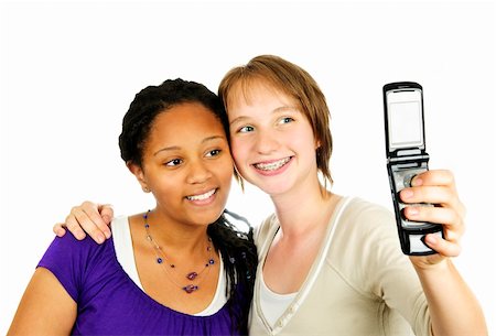simsearch:400-04130279,k - Isolierte Porträt von zwei Weibliche Teenager mit Kamera-Handy Stockbilder - Microstock & Abonnement, Bildnummer: 400-04128248