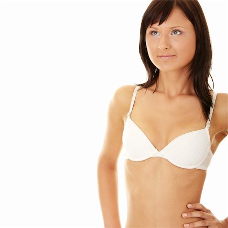 simsearch:400-04125765,k - Young sexy woman in bra and jeans isolated on white Fotografie stock - Microstock e Abbonamento, Codice: 400-04128424