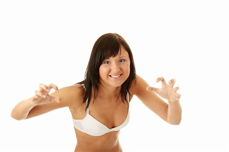 simsearch:400-04125765,k - Young sexy woman in bra and jeans isolated on white Fotografie stock - Microstock e Abbonamento, Codice: 400-04128428