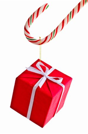 simsearch:400-04259407,k - Closeup of striped candy cane with gift box isolated on white Stock Photo - Budget Royalty-Free & Subscription, Code: 400-04128434