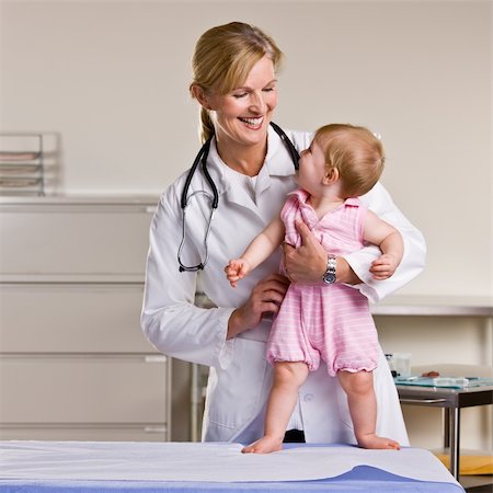 Doctor and baby girl in doctorÕs office Stock Photo - Budget Royalty-Free & Subscription, Code: 400-04128658