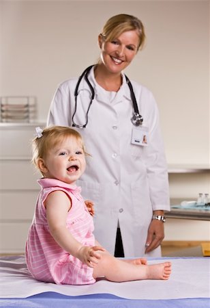 Doctor and baby girl in doctorÕs office Stock Photo - Budget Royalty-Free & Subscription, Code: 400-04128659