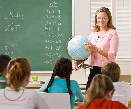 Teacher explaining globe to students Stock Photo - Budget Royalty-Free & Subscription, Code: 400-04128852