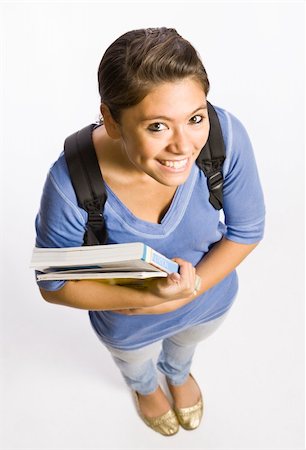 Student wearing backpack carrying books Stock Photo - Budget Royalty-Free & Subscription, Code: 400-04128929