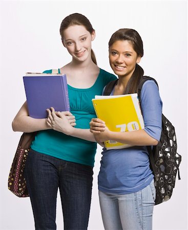 Students carrying book bag, backpack and notebooks Stock Photo - Budget Royalty-Free & Subscription, Code: 400-04128921