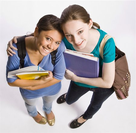 Students carrying book bag, backpack and notebooks Stock Photo - Budget Royalty-Free & Subscription, Code: 400-04128931